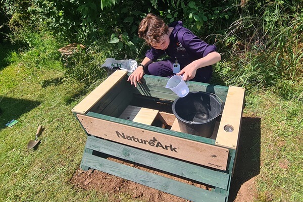 Image of student installing a BioScapes NatureArk at Bridgwater & Taunton College